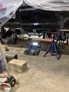 Barrys Custom Fab hi Boy truck up on two blue risers