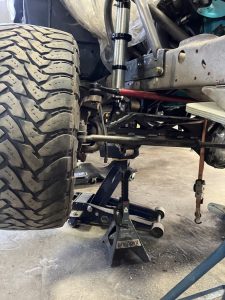 Barrys Custom Fab suspension repair large wheel tilted up